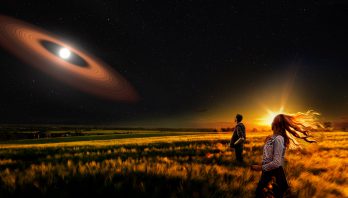 Composite image of people in a field looking at a star with dusty rings