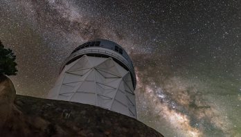 The sparkling band of the Milky Way Galaxy backdrops the Nicholas U. Mayall 4-meter Telescope, located at Kitt Peak National Observatory (KPNO) near Tucson, Arizona.